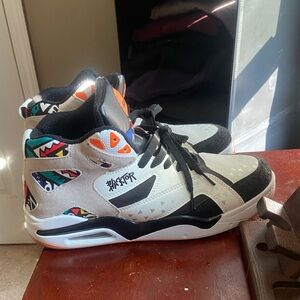 White and Black Air Jordan 5 Sneakers with Shark Teeth Design